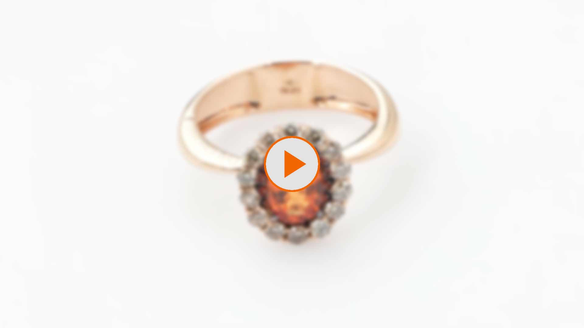 Video preview of ring with mandarin garnet