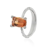 White gold ring with imperial topaz